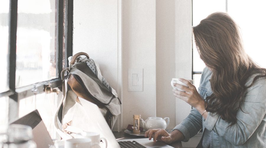 female entrepreneur at coffee shop